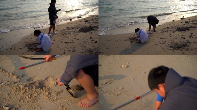 儿童在海边沙滩上玩耍