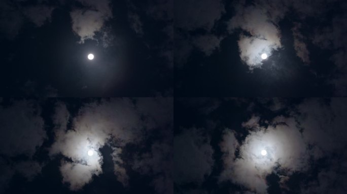 冬天夜空月亮穿梭云层云遮月有月晕