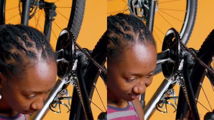 垂直视频专家使用螺丝刀和内六角扳手固定车轮上的自行车