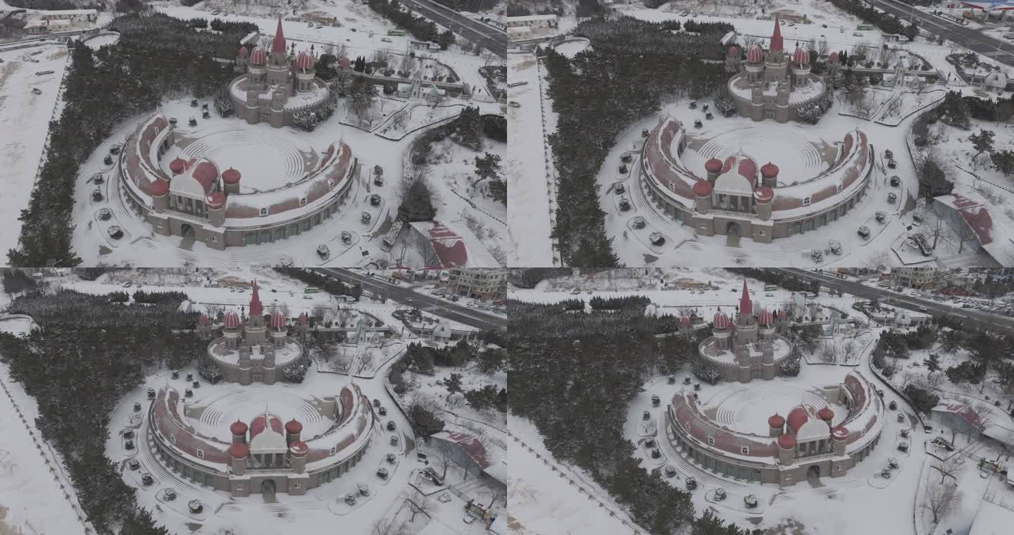 航拍中央电视台威海影视城海岸城堡龙年雪景