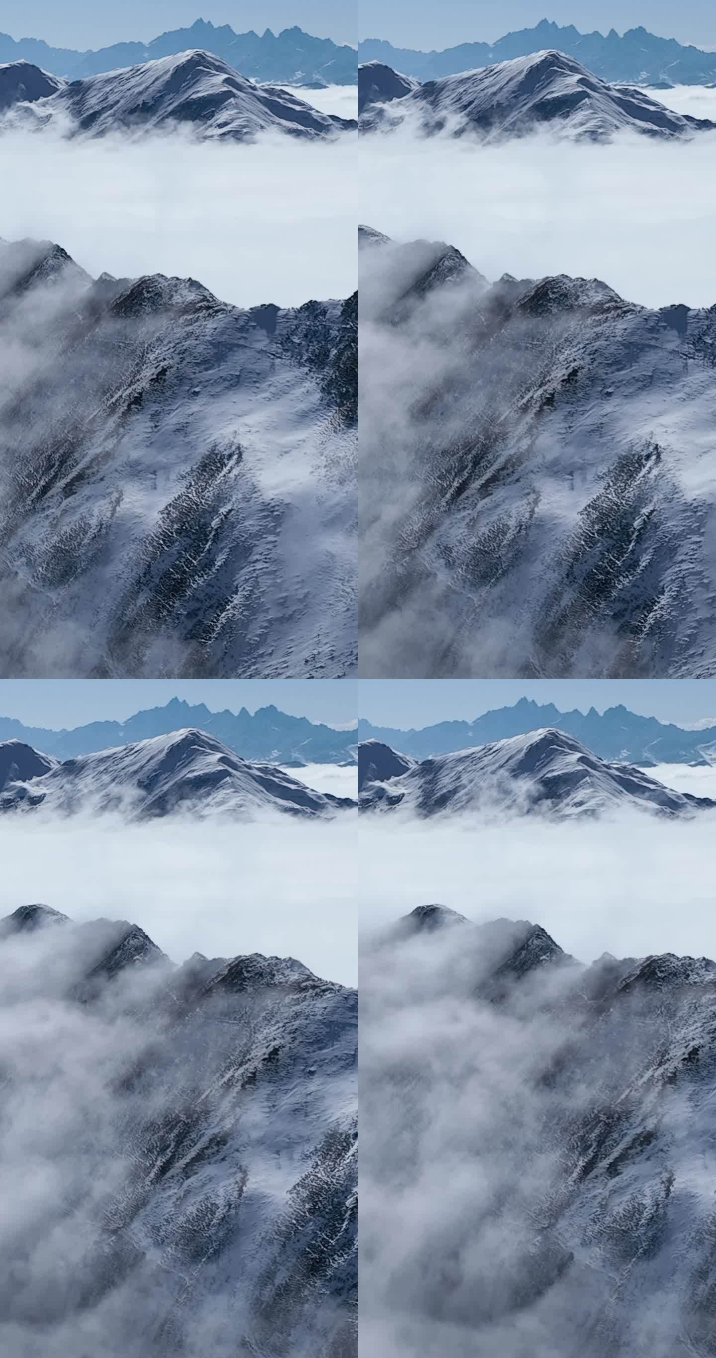冬季航拍蓝天下的夹金山雪山风景