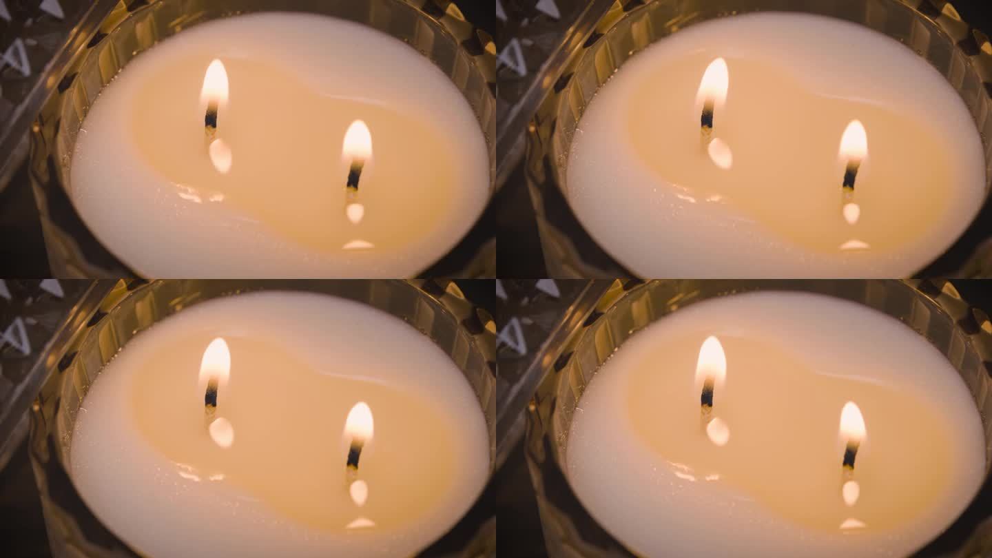 点燃的两芯蜡烛的俯视视图