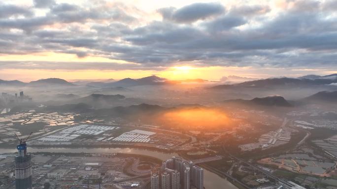 航拍深圳福田香港落马洲日出金光