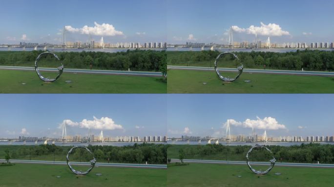 航拍武汉市江滩公园二七长江大桥蓝天白云