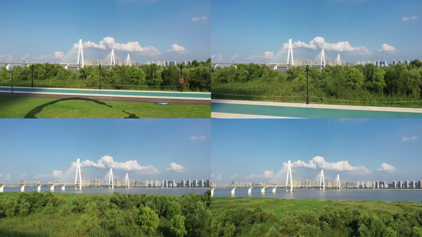 航拍武汉市江滩公园二七长江大桥蓝天白云