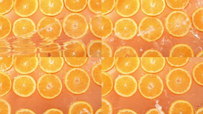 橙子上面泼水水果高清