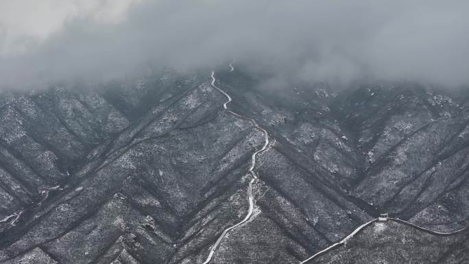 航拍雪后北京延庆八达岭石峡关长城