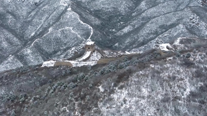 航拍雪后北京延庆八达岭石峡关长城