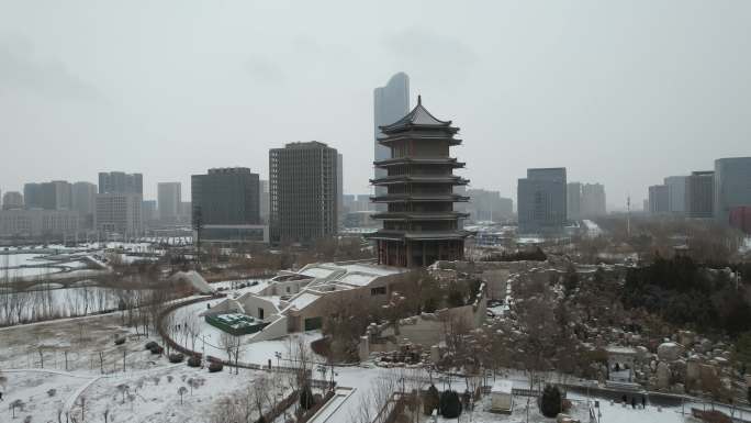 4K航拍 下雪天银川市阅海湾公园