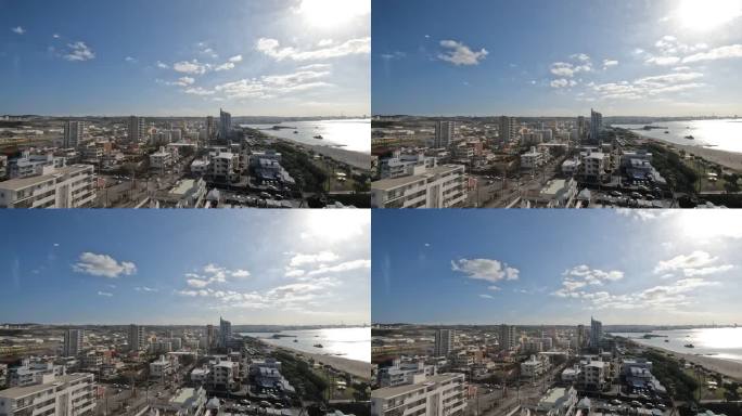 日本冲绳琉球群岛延时蓝天白云街道高楼大厦