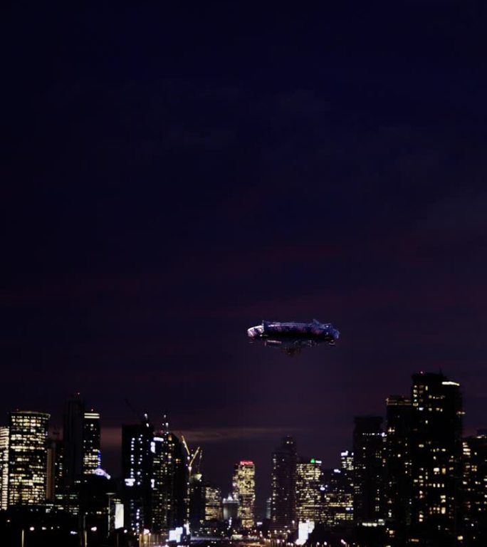 一个不明飞行物在夜晚的城市上空翱翔。