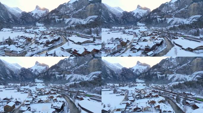风景如画的小镇坐落在阿尔卑斯山下面的山谷里，冬天下雪。