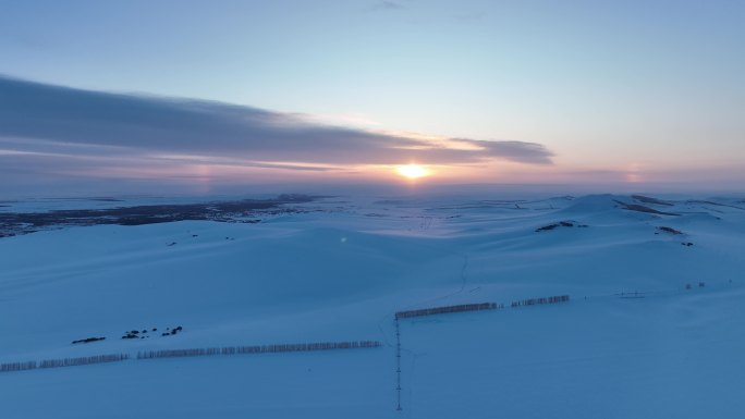 冬天雪野日落晚霞