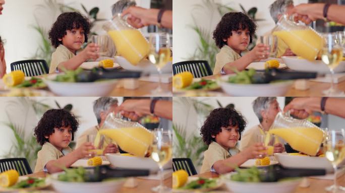 果汁，孩子或家人在晚餐庆祝活动中一起吃饭，食物或饮料的关心或支持。回家，奶奶或父母在餐桌上分享早午餐