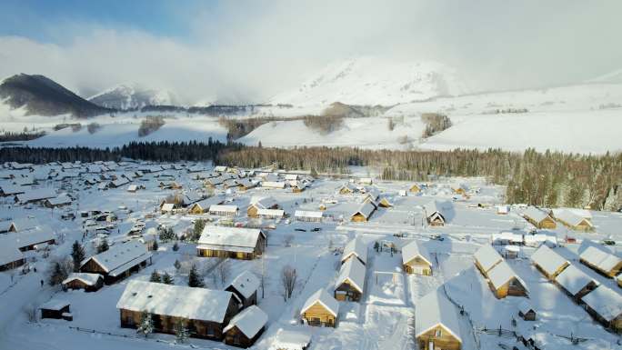 冬季新疆北疆清晨禾木村雪景航拍