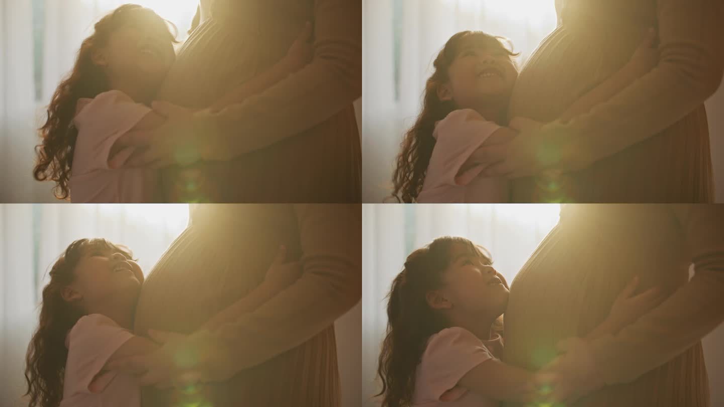 女儿拥抱怀孕母亲十月怀胎大肚子孕妇视频素
