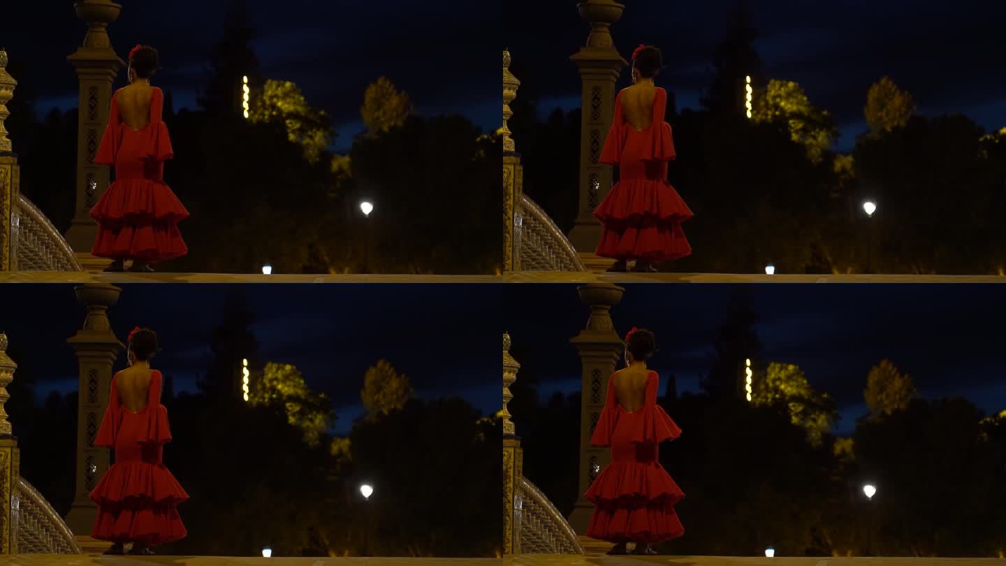 身穿西班牙弗拉门戈舞服装的女子(flamenca或traje de gitana)