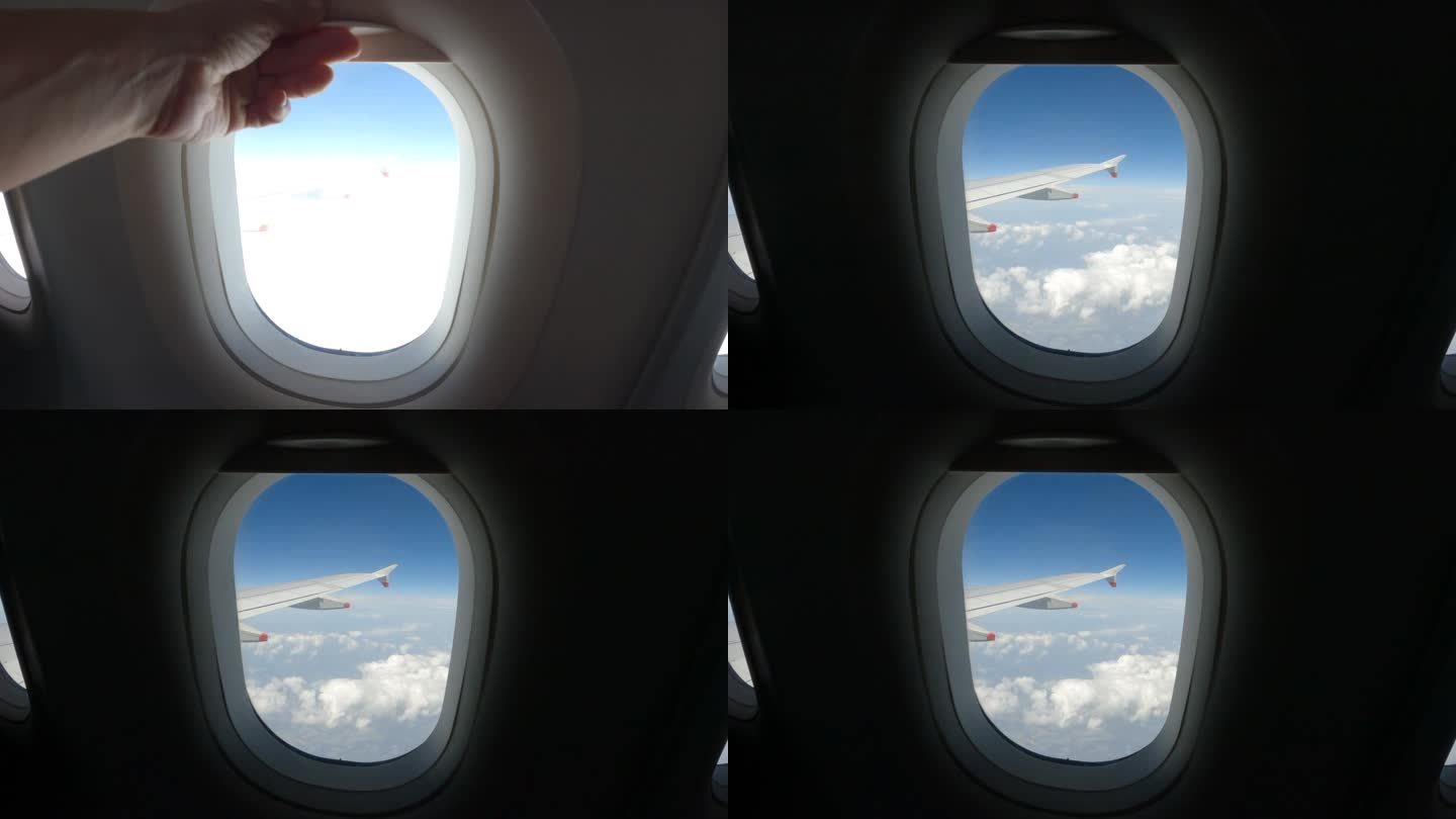 镜头:飞机乘客在飞行过程中掀起了飞机窗户的百叶窗