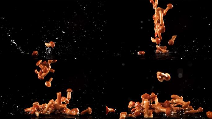 洒上泡过的蘑菇。用高速摄像机拍摄，每秒1000帧。
