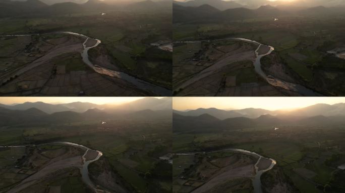 日落的小河在山谷与山脉