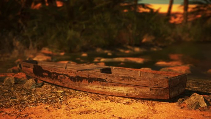 一艘木船停在一片荒地上