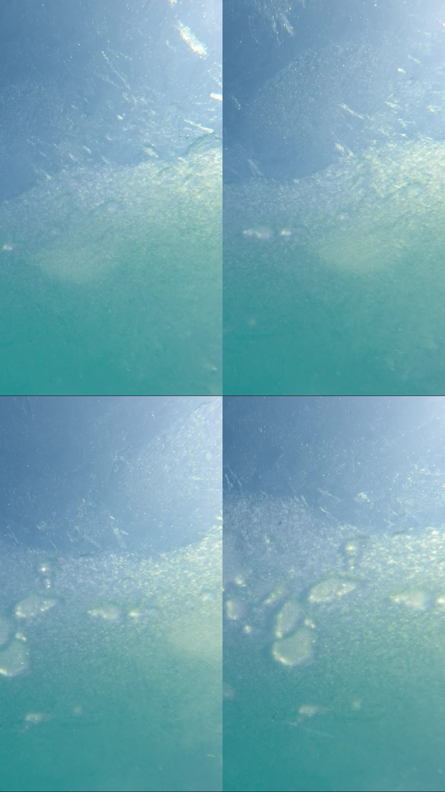 水下看春天的浮冰漂在流动。薄冰在水面上的运动