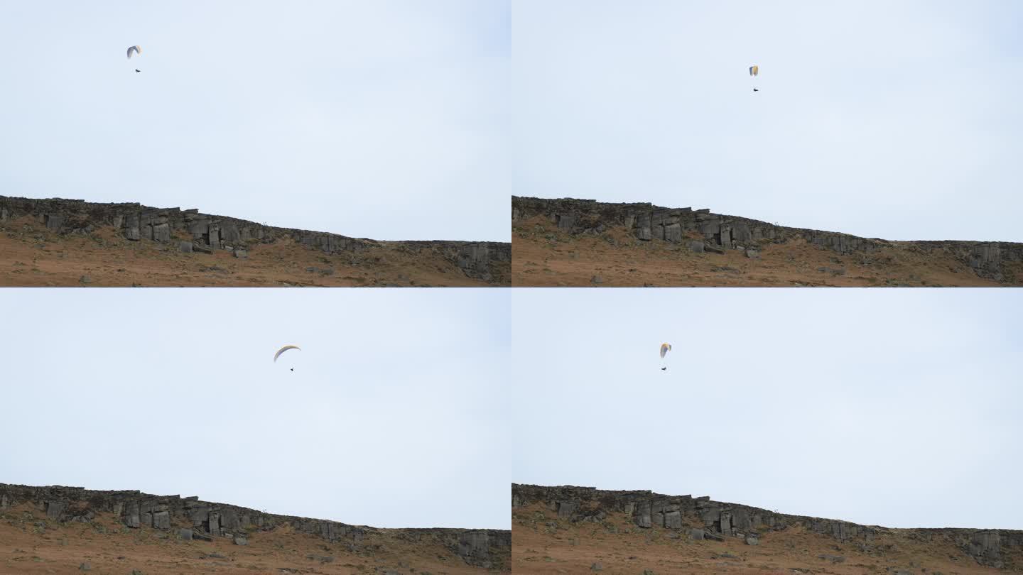 冬季，在德比郡山顶区，单人滑翔伞。