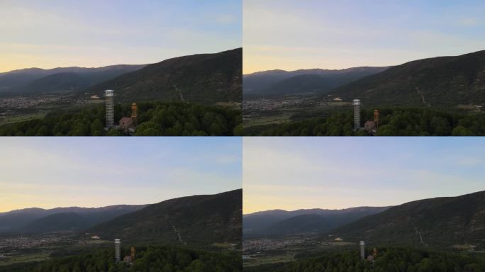 反向飞行与dro可视化火灾监视站位于山顶和城镇，与山的背景