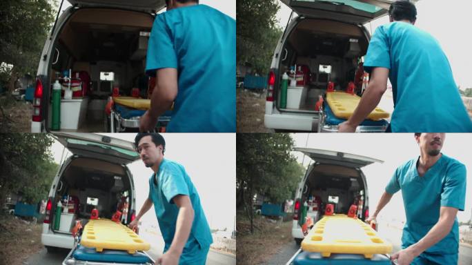 一名男护士正从急救车里拖出一张移动急救床