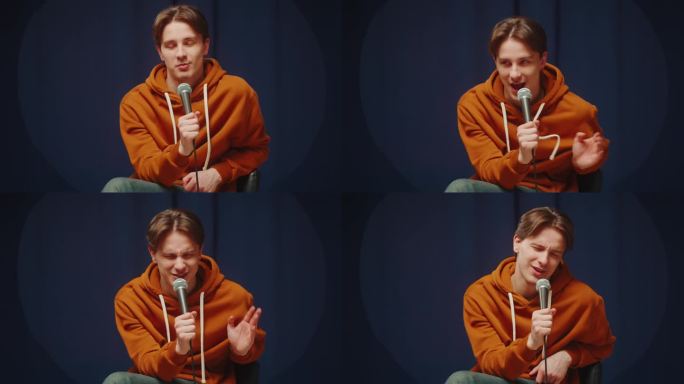 单口相声咖啡馆，喜剧音乐会。一个人在舞台上讲笑话。男喜剧演员演讲者用麦克风与观众表演，幽默的独白。导