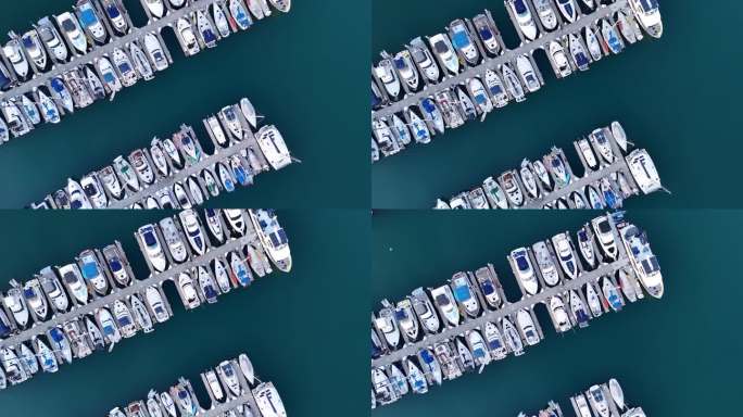 多艘船整齐地停靠在加州的Oceanside港(鸟瞰图)
