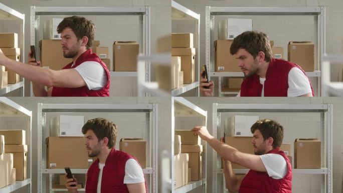 身穿红色背心的男子，仓库员工用智能手机给包裹拍照，在纸板箱的背景上查找快递箱的信息。物流、配送和仓储