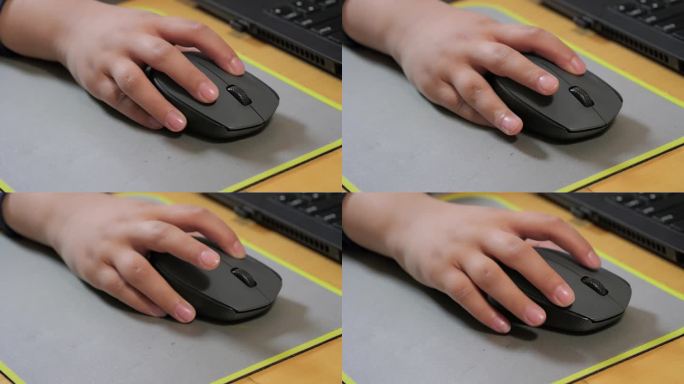 儿童使用鼠标特写，少儿童编，计算机教育