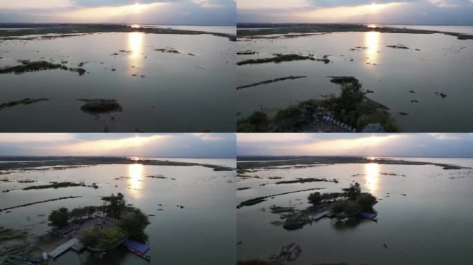 日落前无人机拍摄的帕瑶湖古庙鸟瞰图