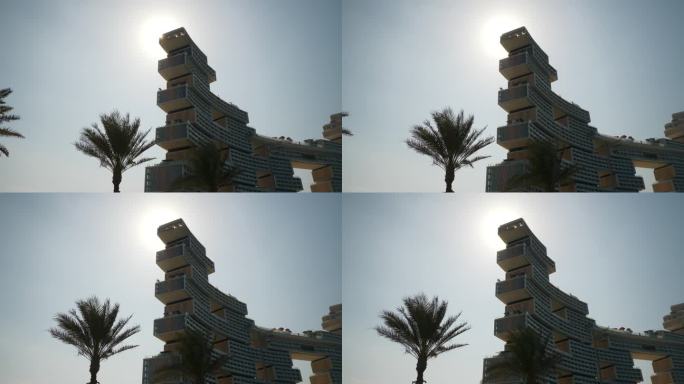 白天迪拜城棕榈岛最著名的新现代豪华酒店外正面阳光慢动作全景4k阿联酋