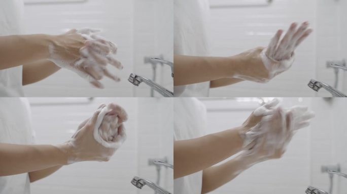 在水槽中用肥皂洗手的特写镜头