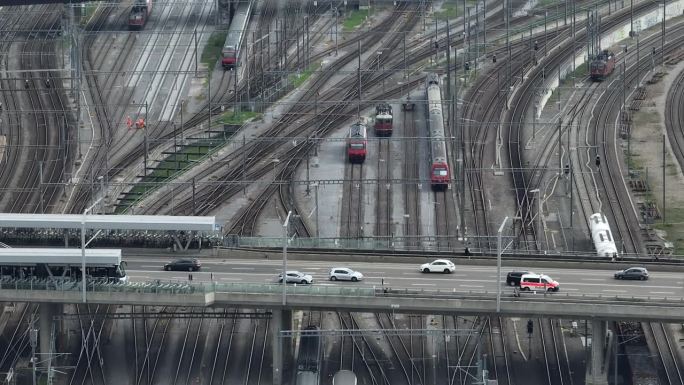 白天飞行在苏黎世市中心火车站铁路交通大桥鸟瞰图4k瑞士