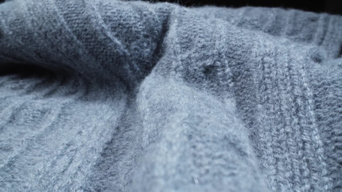 羊毛围巾。纺织品微距拍摄。镜头滑过羊绒