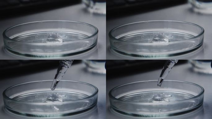 【特写】一种清澈的液体滴在开始融化的干燥的白色物质上。实验室测试。反应与催化剂