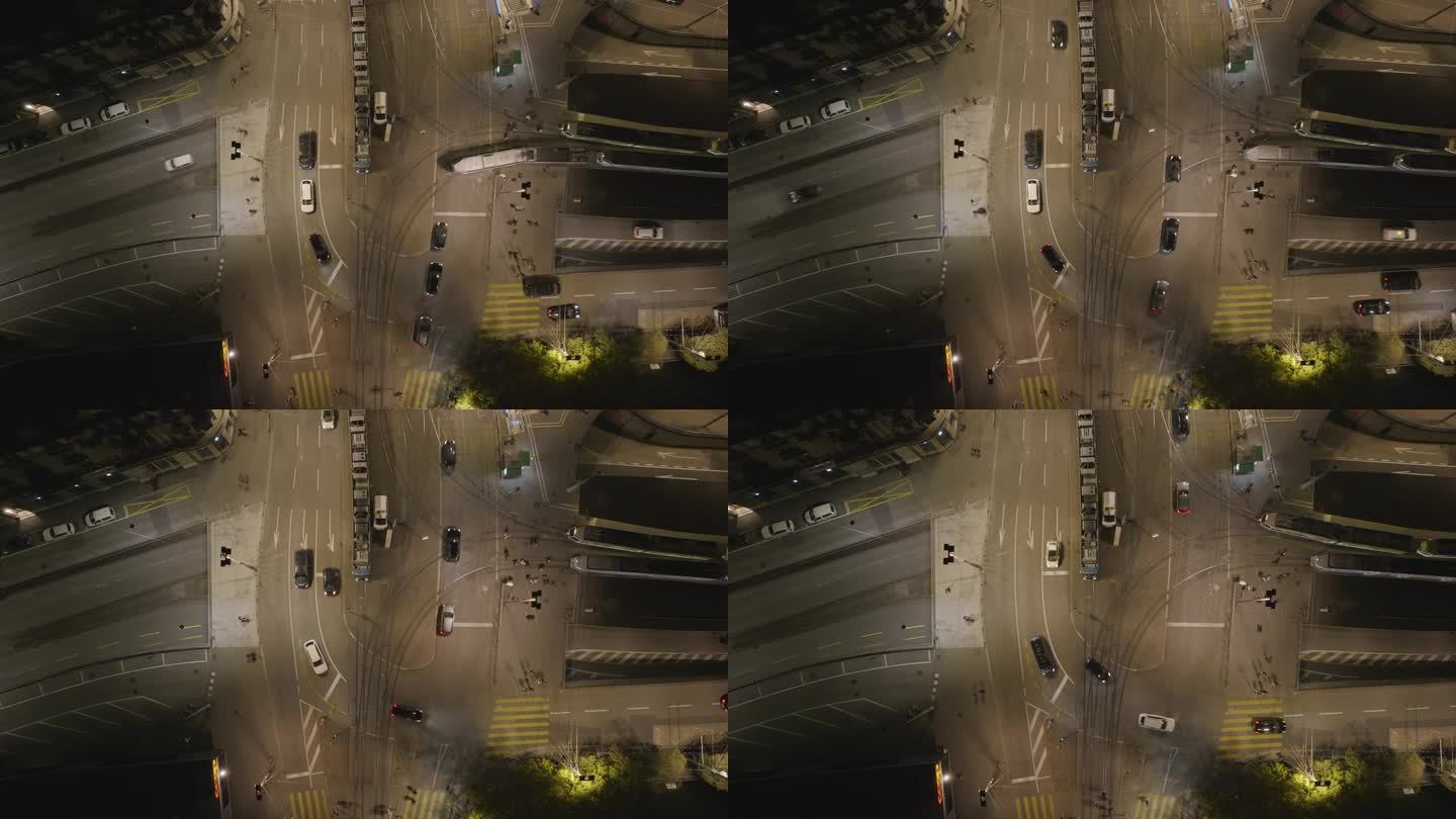 夜间照明苏黎世市中心有轨电车交通街道十字路口空中俯视全景4k瑞士