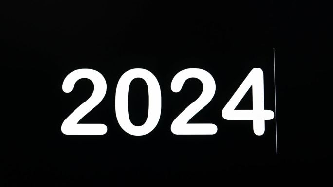 用黑体字编码2024年的数字，显示在电脑屏幕的黑色背景上，以庆祝即将到来的一年。