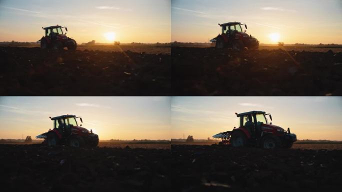SLO MO男性农学家在黄昏时对着天空的拖拉机耕作有机农场