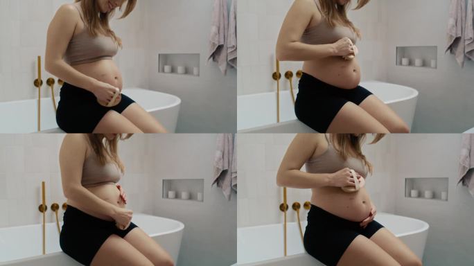 孕妇正在擦干身体