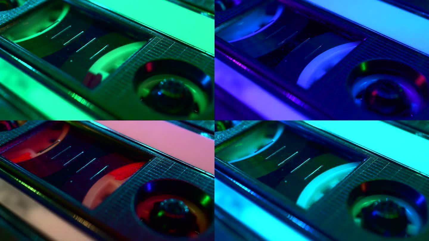 俱乐部里五颜六色的灯光照亮了正在播放的盒式磁带