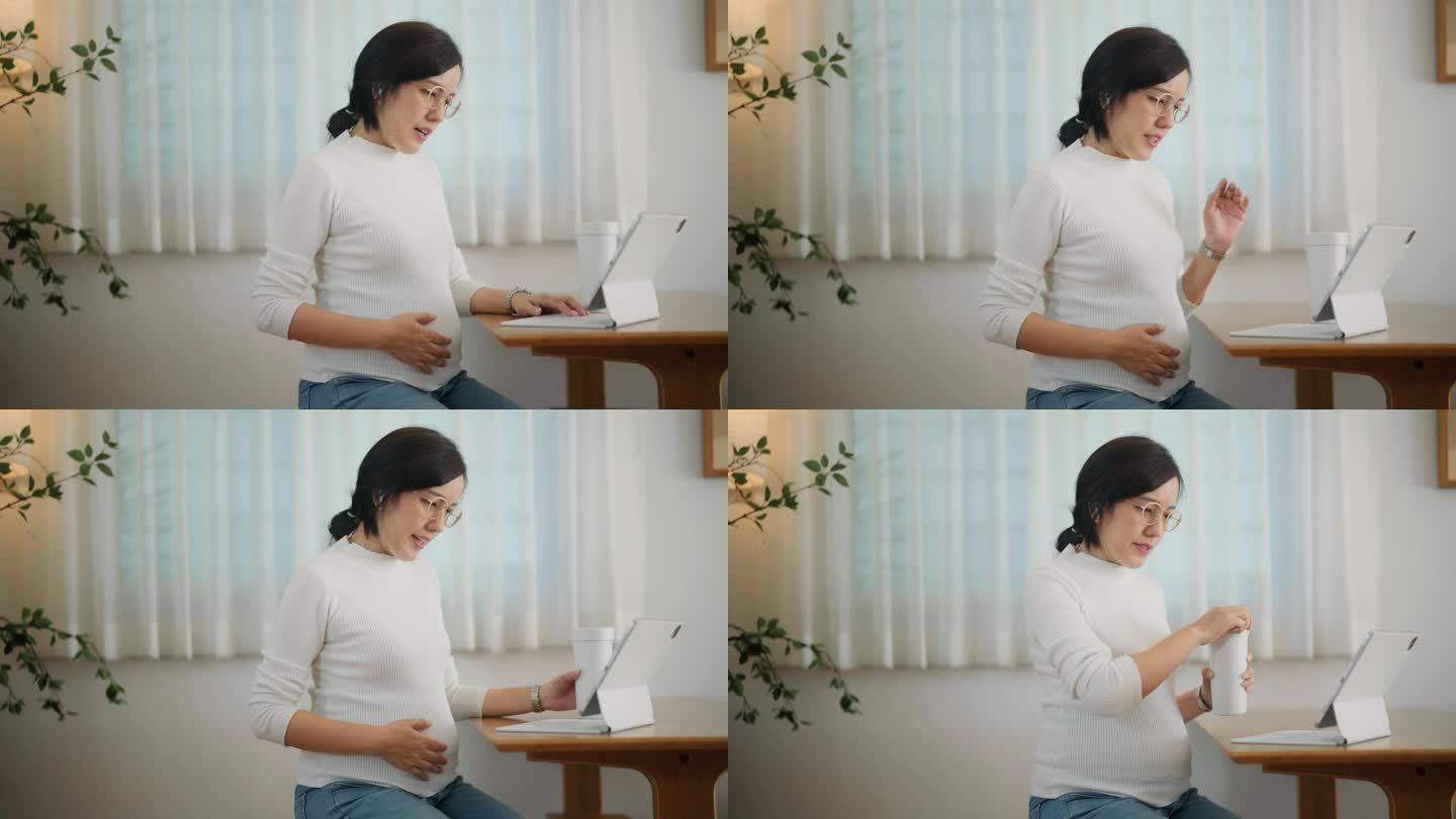 孕妇坐在网上开会，开会时喝水。