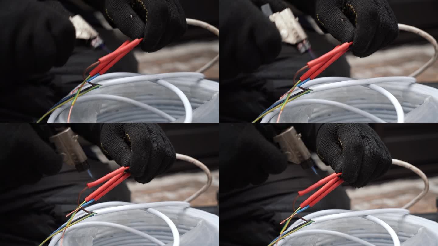 电工用烙铁焊接电线。烙铁，接线修理。师傅用气焊铁焊接电线