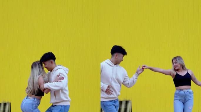 充满活力的城市街舞:中国男人和金发白种人女人跳五彩缤纷的拉丁舞