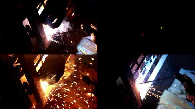 高清视频:金属工人在夜间用焊机修理铁门。