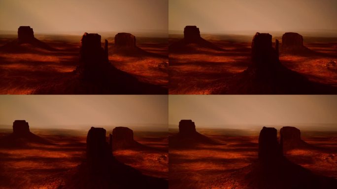 一张沙漠的照片，前景有几块岩石