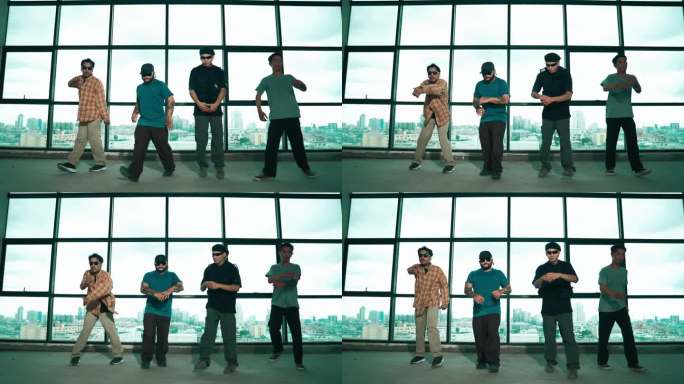 一群多元文化霹雳舞者与摩天大楼共舞。嘻哈。